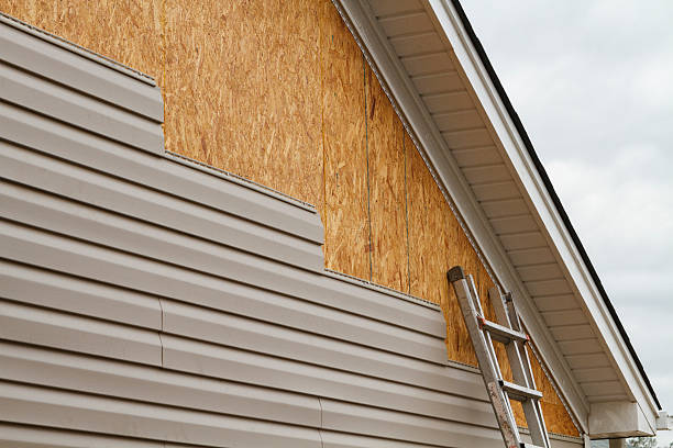 Professional Siding Replacement technician working in Freeport, PA